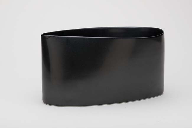 Artwork: Large black oval vessel