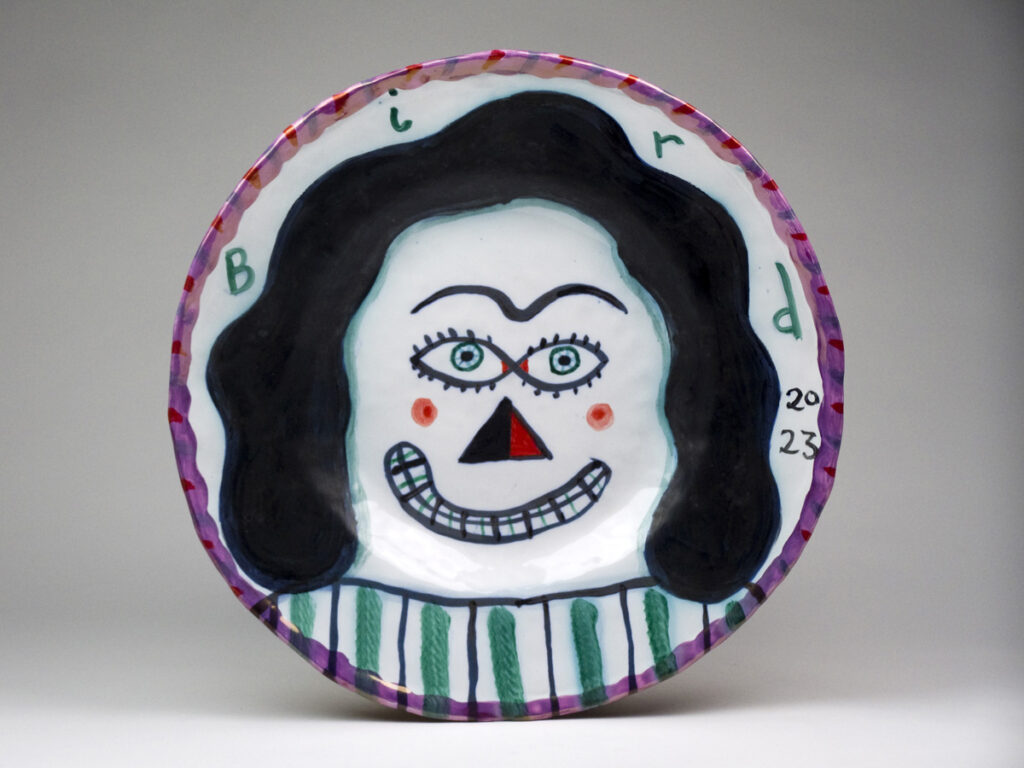 Artwork: Smiling woman with green stripes