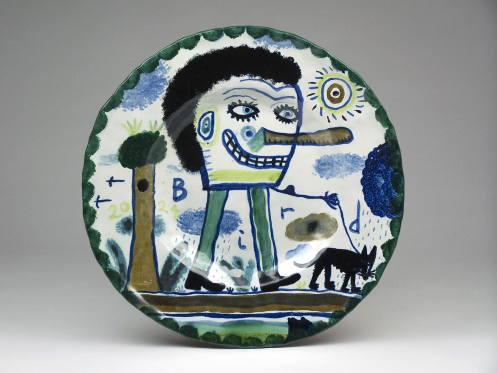 Artwork: Man walking a dog