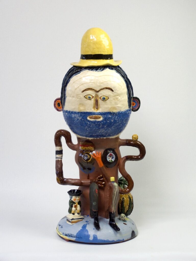 Artwork: Sitting man with pineapple